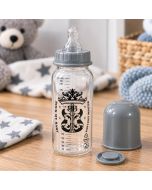 Rock Star Baby babyfles Gitaar 250 ml van Tico Torres met speen, maatverdeling en beschermkap. Stoer zwart-zilver design, ca. 5,4 x 5,4 x 20 cm.