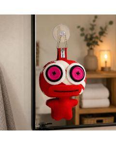 Unieke Crazy Doll met zuignap in rood met roze knoopogen. Ca. 8 x 11 cm. Opvallende decoratie voor raam of spiegel. Slechts 1 exemplaar.