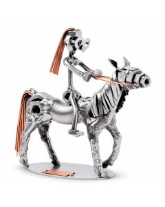 Handgemaakte Hinz & Kunst sculptuur van een meisje op pony met zadel, teugels en koperkleurige manen. Ca. 13 x 18 x 15 cm.
