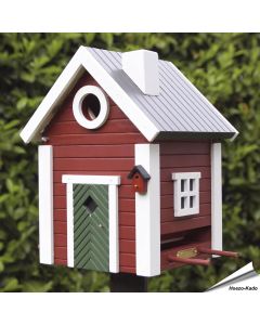 Multiholk Torp voederhuis en nestkast in rood/witte houtkleur, hier als nestkast.