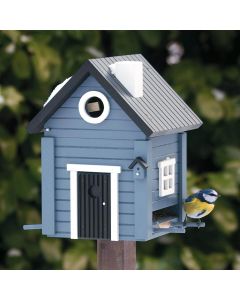 Multiholk Blatt Hus van Wildlife Garden combineert nestkast en voederhuis in één. Met blauwgrijze gevel, 32 mm invliegopening en ca. 2 liter voerreservoir.