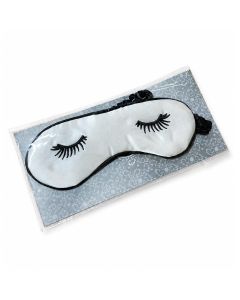 Wit slaapmasker met zwarte wimpers en zwarte rand. Gemaakt van nylon en ca. 185 x 70 mm groot. Compact oogmasker voor thuis en onderweg.