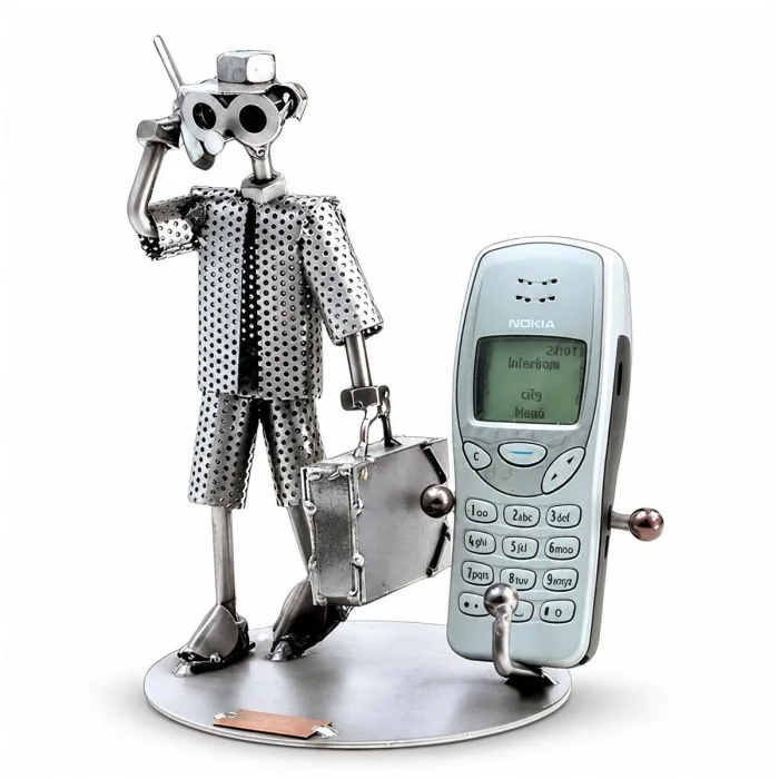 Handgemaakte Hinz & Kunst GSM-houder met metalen schroefman. Praktische telefoonhouder voor bureau of werkplek, 17 x 14 x 19 cm.