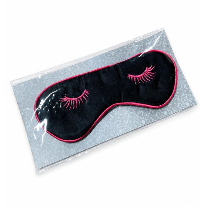 Zwart oogmasker met roze wimpers en roze rand. Gemaakt van nylon en ca. 185 x 70 mm groot. Speels slaapmasker voor thuis of onderweg.