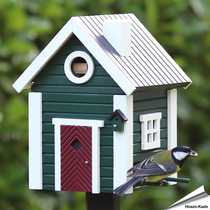 Multiholk Stugan voederhuis en nestkast in groen/witte houtkleur, hier als voederhuis